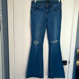 “Celebrity Pink” jeans distressed low rise